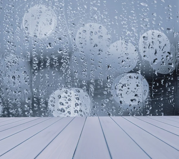 Empty table with blurred, window, rain drops  background, for product display template — Stock Photo, Image