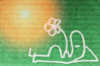 Adam yeşil karton üzerinde çizilmiş ışığında rahatlatıcı.