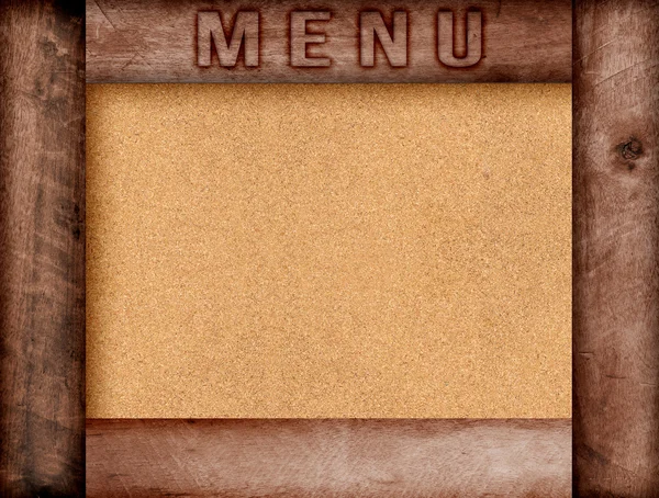 Word menu written, burned lettering on wooden brown frame with copy space on pin board background. — Stock Photo, Image