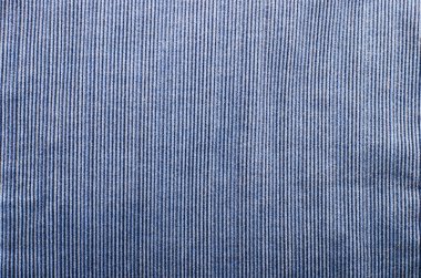 Blue corduroy fabric texture close up photo background. clipart