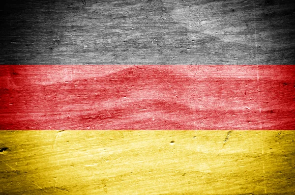 Deutschlandfahne auf altem Holzbrett bemalt, Texturhintergrund. — Stockfoto