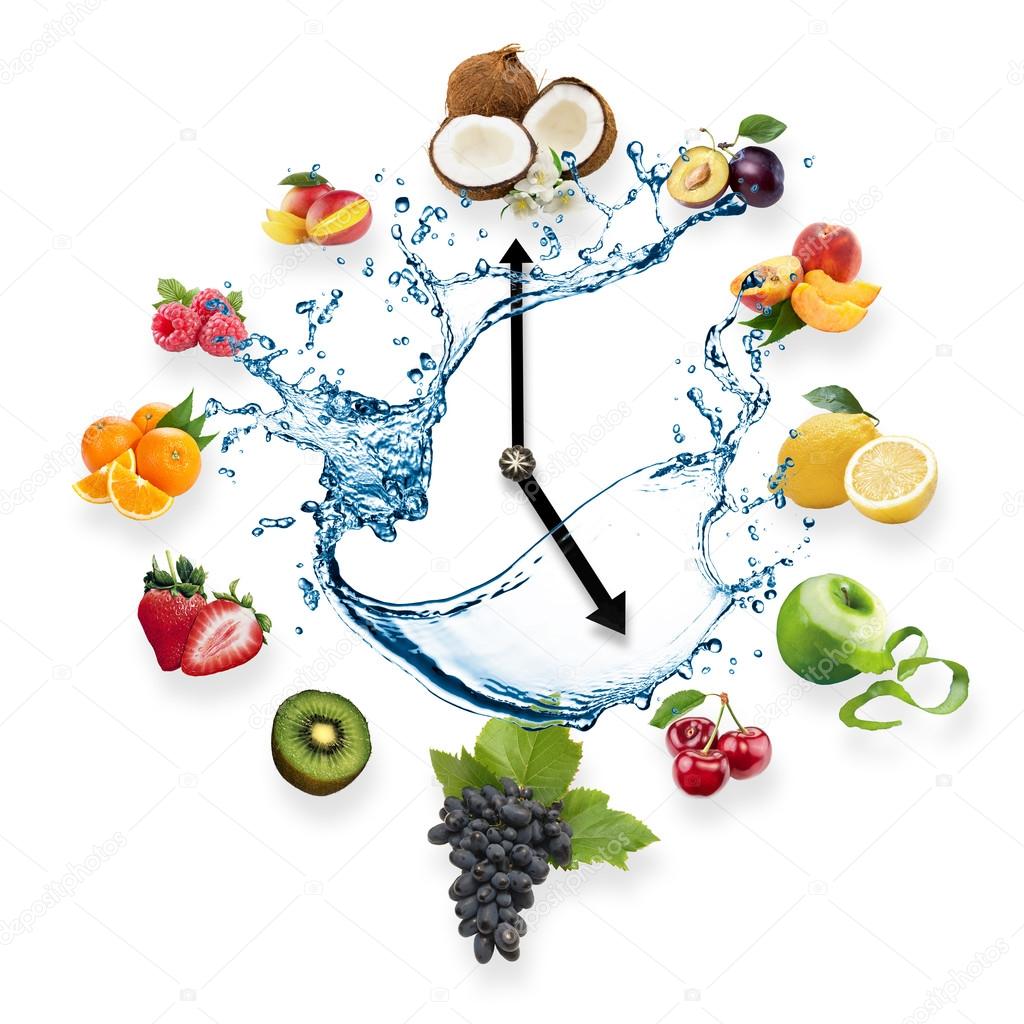 Clock arranged from healthy fruits splash by water isolated on white