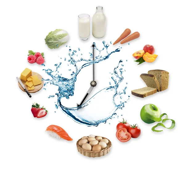 Klok gerangschikt van gezond voedsel producten splash water geïsoleerd op een witte achtergrond. Gezonde voeding concept. — Stockfoto