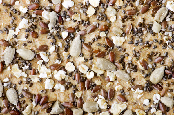 Хрустящие булочки с подсолнухом, чиа и кунжутом. Крупный план, здоровый фон
.