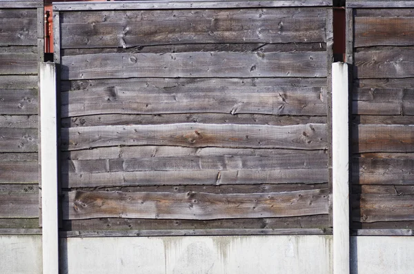 A close up section of horizontal, overlap wooden garden fence in brown. Manchester. — Stock Photo, Image