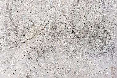 arka plan olarak çatlaklar ile beyaz kirli duvar 