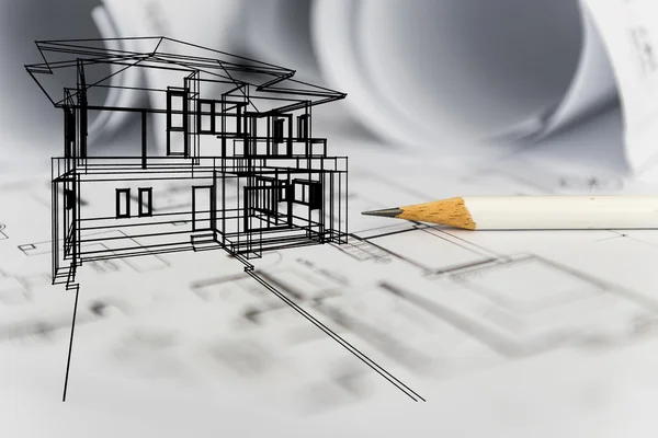 Концепция чертежа дома мечты дизайнером со строительным чертежом — стоковое фото