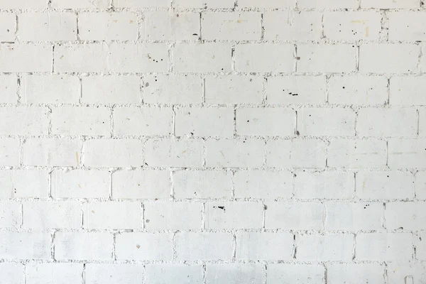 Pared de ladrillo grunge blanco como fondo — Foto de Stock