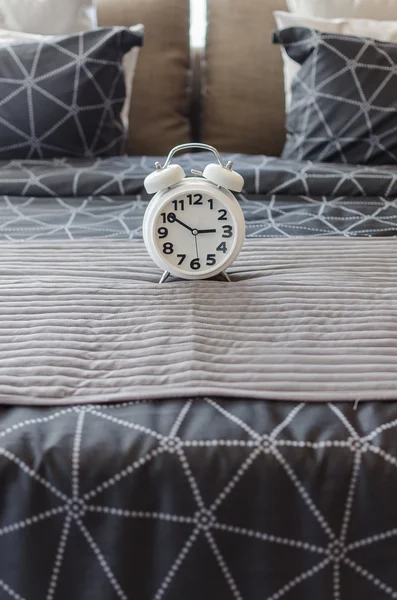 White alarm clock in bedroom — Stock Photo, Image