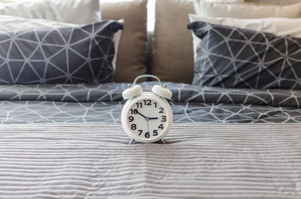 White alarm clock in bedroom — Stock Photo, Image