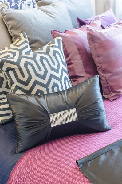 Multicolor pillows on bed — Stock Photo, Image