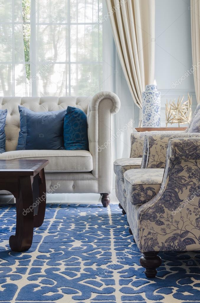 Luxury living room with sofa on blue pattern carpet — Stock Photo