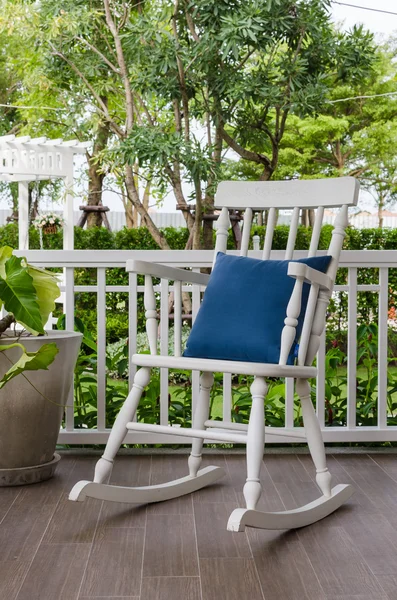 White wooden rocking chair on front porch — Stock Photo, Image