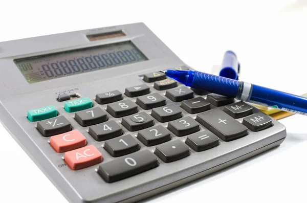 Old silver calculator with book and pen — Stock Photo, Image