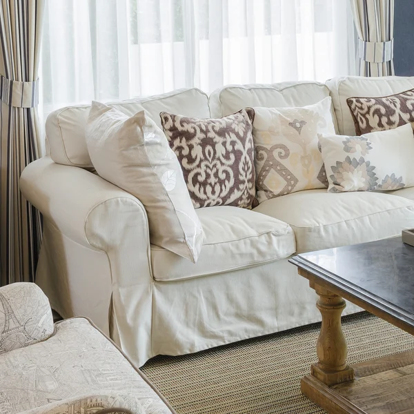 Beige color sofa and pillows in living room — Stock Photo, Image