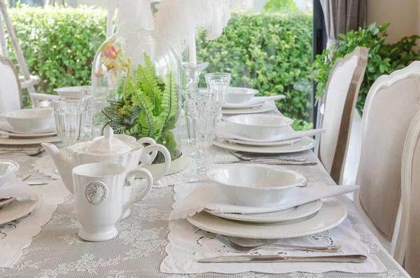 Table set in white dinning room — Stock Photo, Image