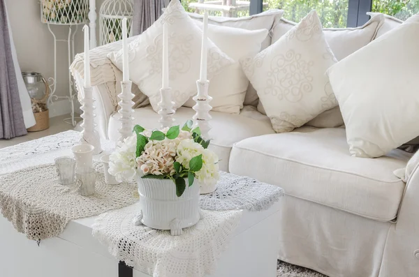 Flower in vase on white table in living room — Stock Photo, Image