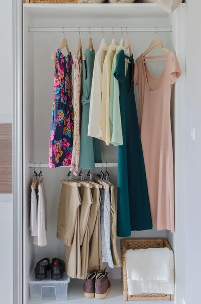 White closet with clothes, dress, and shoes — Stock Photo, Image