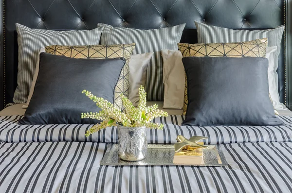 Pillows on blue sofa with lamp — Stock Photo, Image