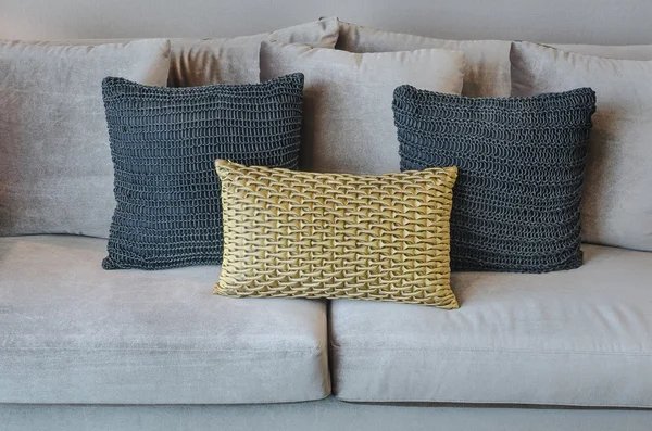 Pillows on blue sofa with lamp — ストック写真