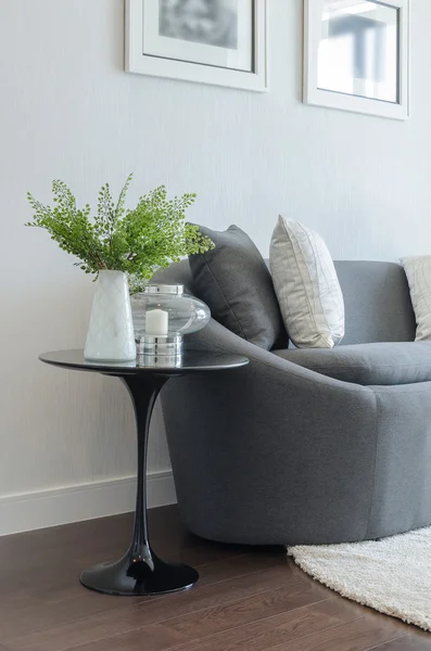 Pillows on blue sofa with lamp — Stock Photo, Image