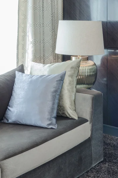 Row of pillows on modern sofa in living room — Stock Photo, Image