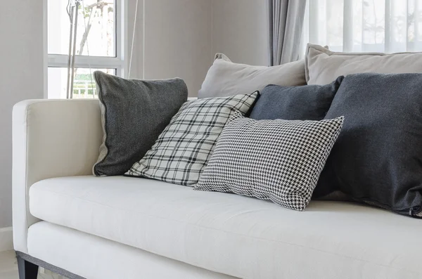 Modern white sofa in modern living room with pillows — Stock Photo, Image