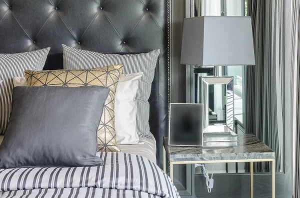 Luxury black and white bedroom with grey lamp on table — Stock Photo, Image