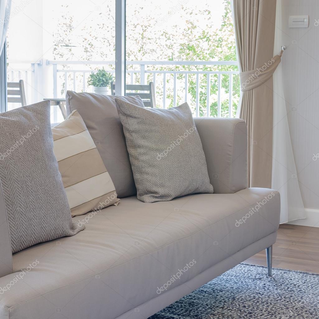 Earth Tone Color Sofa With Pillows In Modern Living Room Stock Earth Tone Color Sofa With Pillows In Modern Living Room Stock Photo