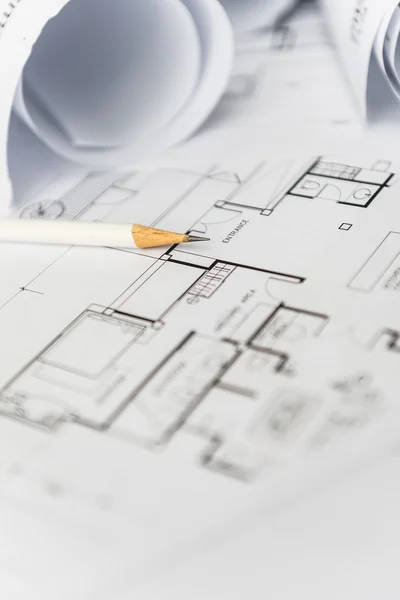 Vit penna på arkitektoniska för konstruktionsritningar — Stockfoto
