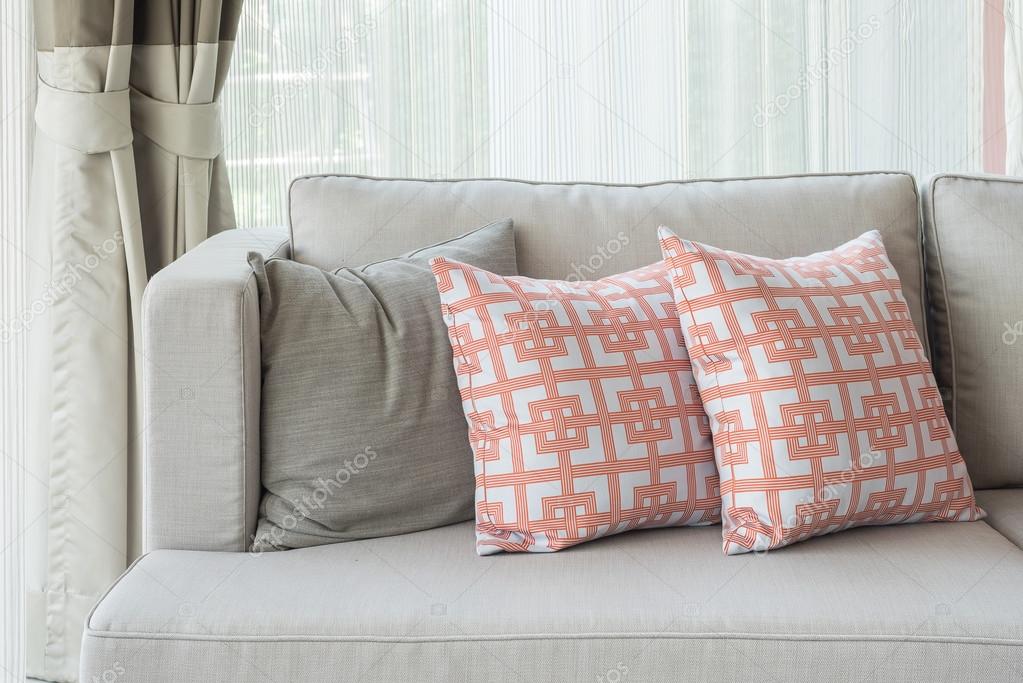 Row of pillows on modern sofa in classic living room style — Stock