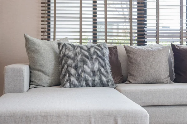 Pillows on modern sofa in living room — Stock Photo, Image