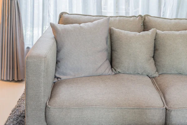 Modern sofa with pillows in living room — Stock Photo, Image