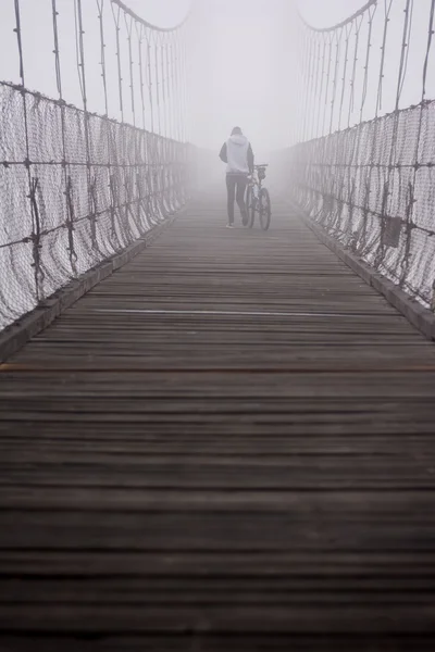 Girl walking in to the mist ,Thailand — Stock Photo, Image