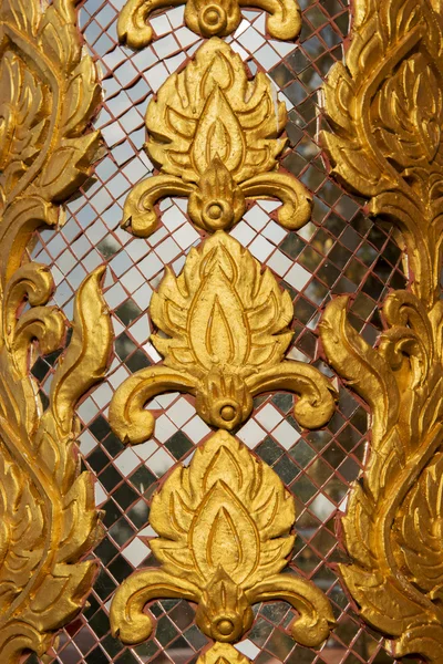 Wall carving art with stained glass in the temple ,Thailand — Stock Photo, Image