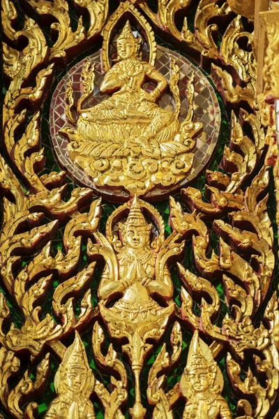 Ancient golden carving wooden window of Thai temple — Stock Photo, Image