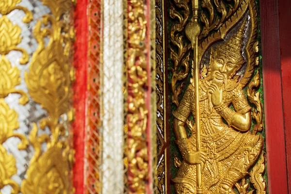 Ancient golden carving wooden window of Thai temple — Stock Photo, Image