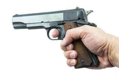 Colt Mark IV series80 hükümet m1911 elinde beyaz bir arka plan izole.