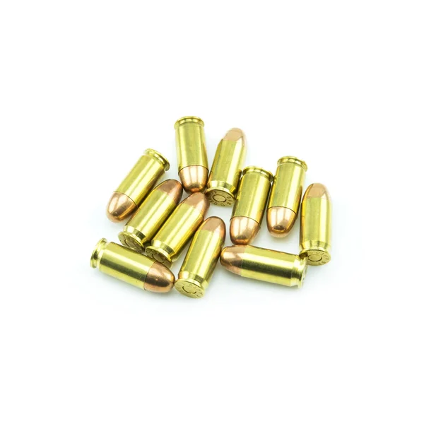 Grupo de balas de 11mm isoladas em um fundo branco . — Fotografia de Stock