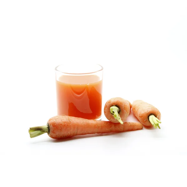Carot juice and fresh baby carots — Stock Photo, Image