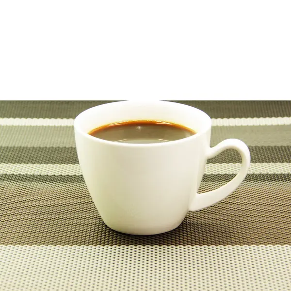 Espresso in white cup on tablemat — Stock Photo, Image