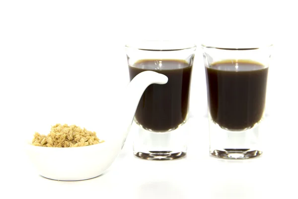 Black coffee shots with oat cereals — Stock Photo, Image