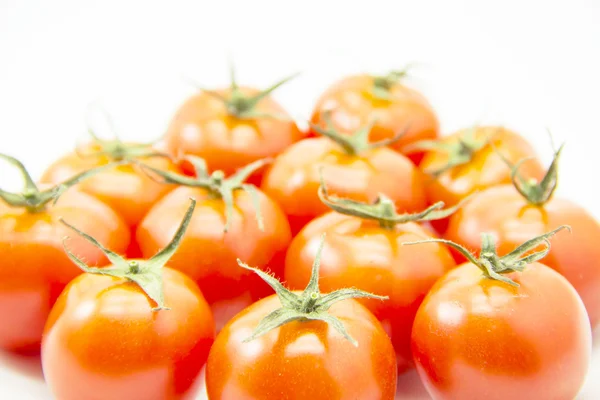 Groep van tomaten met groen blad — Stockfoto