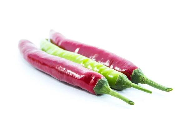 Contrast green and red chili pepper color — Stock Photo, Image