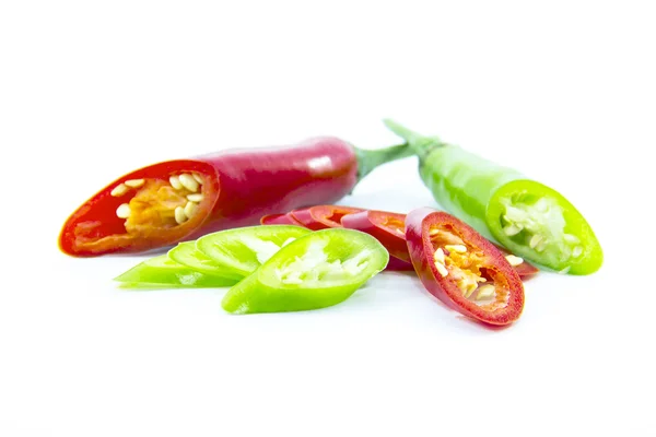 Pieces of green and red chili pepper — Stock Photo, Image