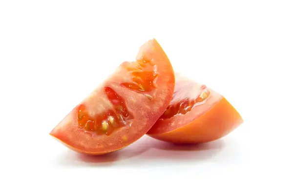 Bitar av ekologisk röd tomat — Stockfoto