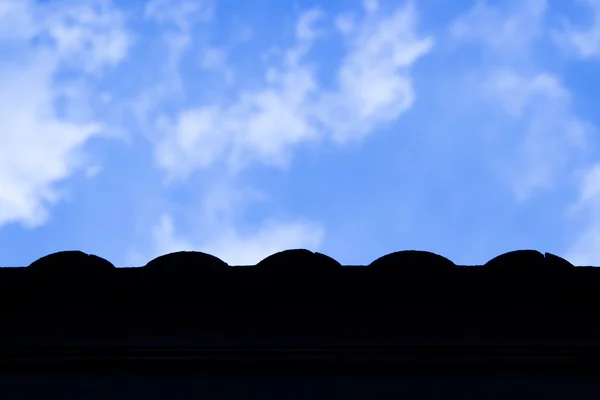 Cloudy sky with shadow shingle roof — Stock Photo, Image