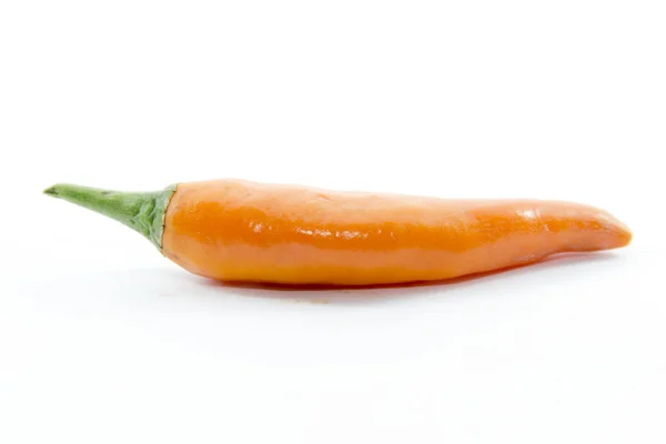 Orange curve chili pepper — Stock Photo, Image