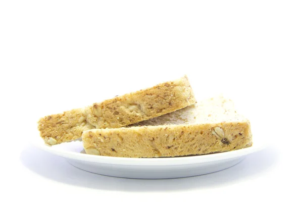 Beyaz tabağa dilimlenmiş sandviç — Stok fotoğraf
