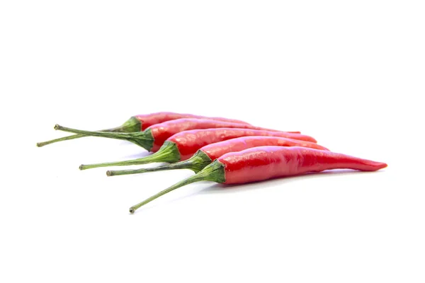 Red chili peppers with green stick — Stock Photo, Image